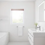 Stylish sonni Spiegelschrank in a modern bathroom with integrated lighting features.