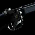 Detail view of forced reset trigger showcasing its mechanics and engineering features.