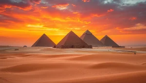 Visitors marvel at the iconic piraminds against a dramatic sunset backdrop in Giza.