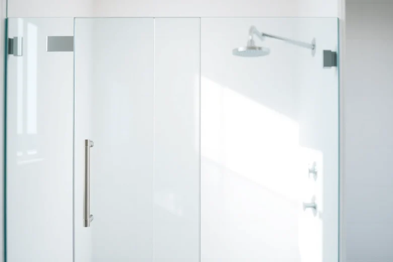 Modern shower screen door displayed in a bright, elegant bathroom showcasing sleek design and quality.