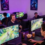 Engaged players enjoying NSFW AI gaming in a lively, neon-lit setup.